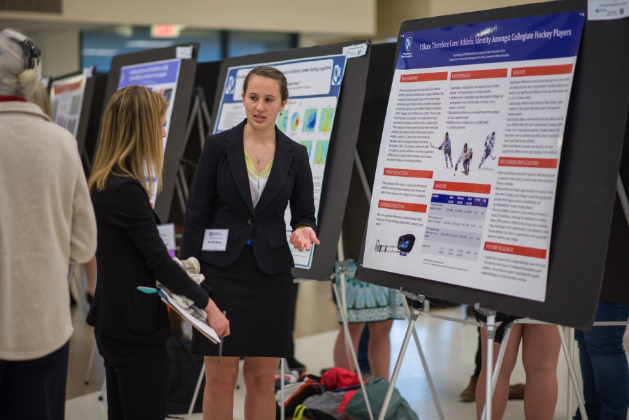 A UNH student presenting the results of her research during the UNH College of Life Sciences and Agriculture Undergraduate Research Conference 2018