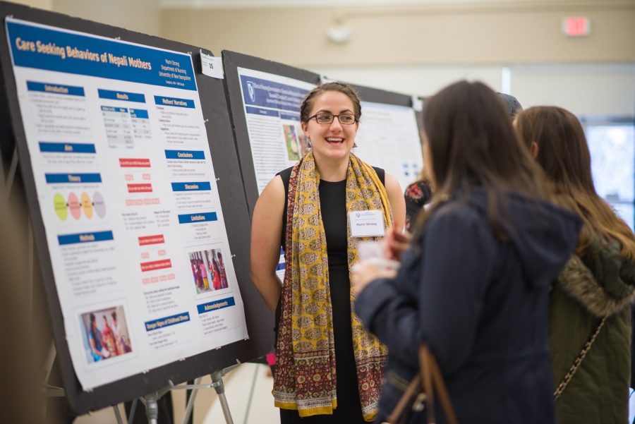 A UNH student presenting the results of her research during the UNH College of Life Sciences and Agriculture Undergraduate Research Conference 2018