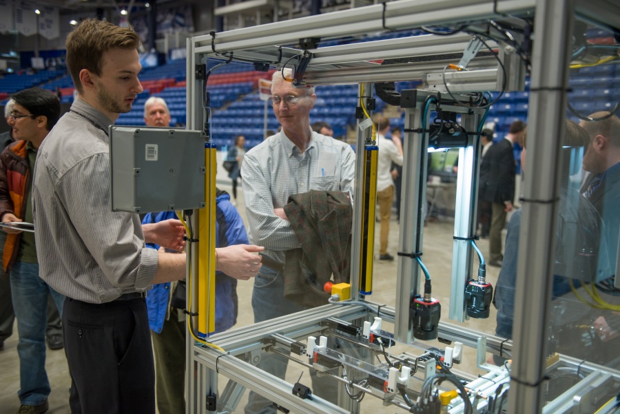 A University of New Hampshire student presenting research results during the 2018 Interdisciplinary Science and Engineering Symposium, part of the annual UNH Undergraduate Research Conference