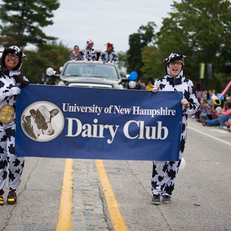 members of the UNH Dairy Club in the homecoming parade