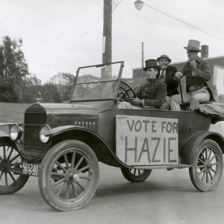1930 Mayoralty campaign candidate Edward Haseltine and his managers in a car with a Vote for Hazie sign on the side
