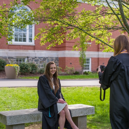 UNH seniors pose for pre-graduation pictures on campus during the week before commencement