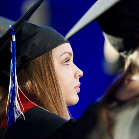 A UNH Manchester student attends Commencement