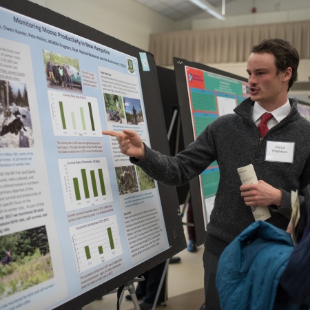 A UNH student in the College of Life Sciences and Agriculture presents the results of his research during the Undergraduate Research Conference 2018