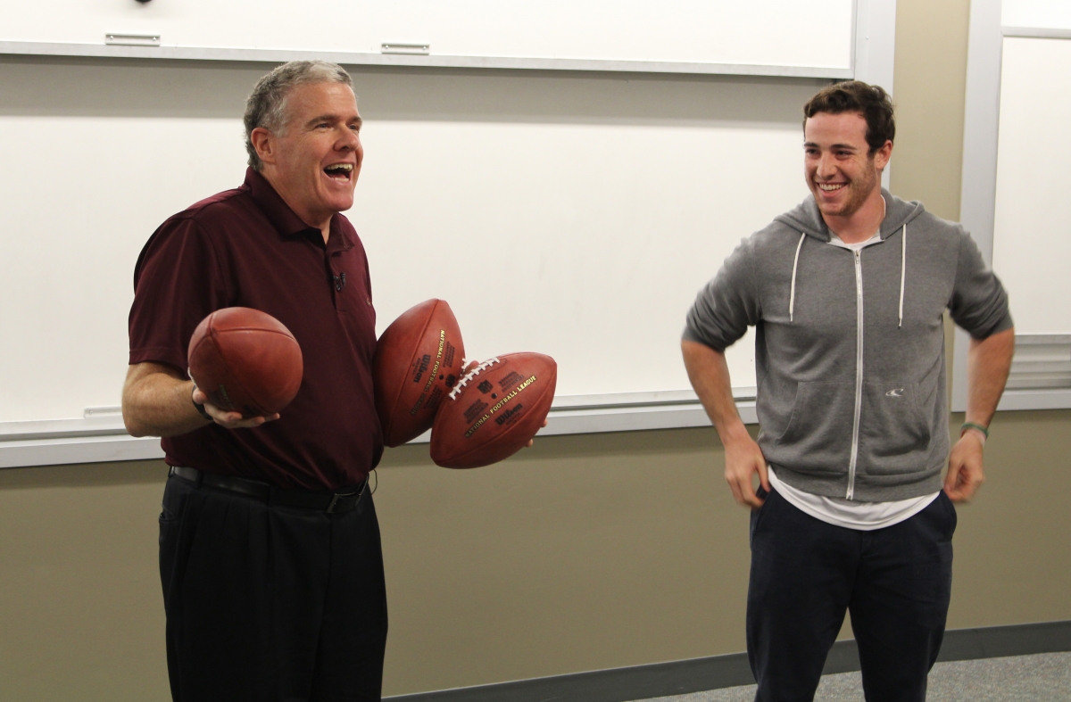 Peter King with UNH football quarterback Adam Riese