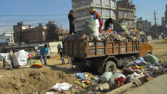 picking through trash in Nepal