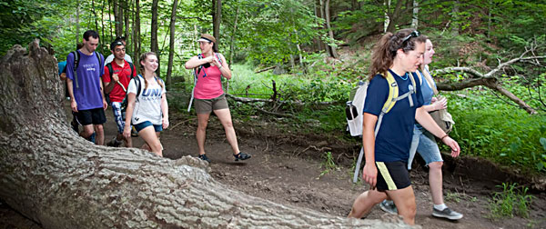 Wilderness-certified guides, led a trek up South Mountain at Pawtuckaway State Park to witness the Summer Solstice sunset on Wednesday, June 20, 2012.