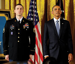Army Staff Sergeant Ryan Pitts ’13 with President Obama