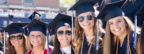 Graduates standing in a line