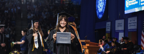 Graduate with diploma