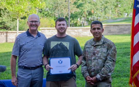 Jon Davis receiving award