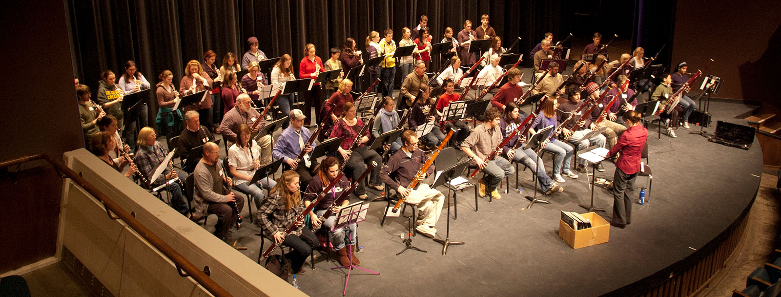 High shot of double reed day ensemble playing onstage