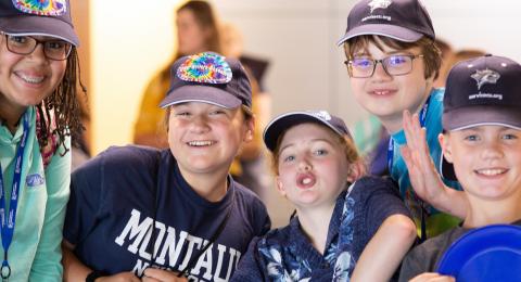 Group of kids at writers academy camp smiling for a picture